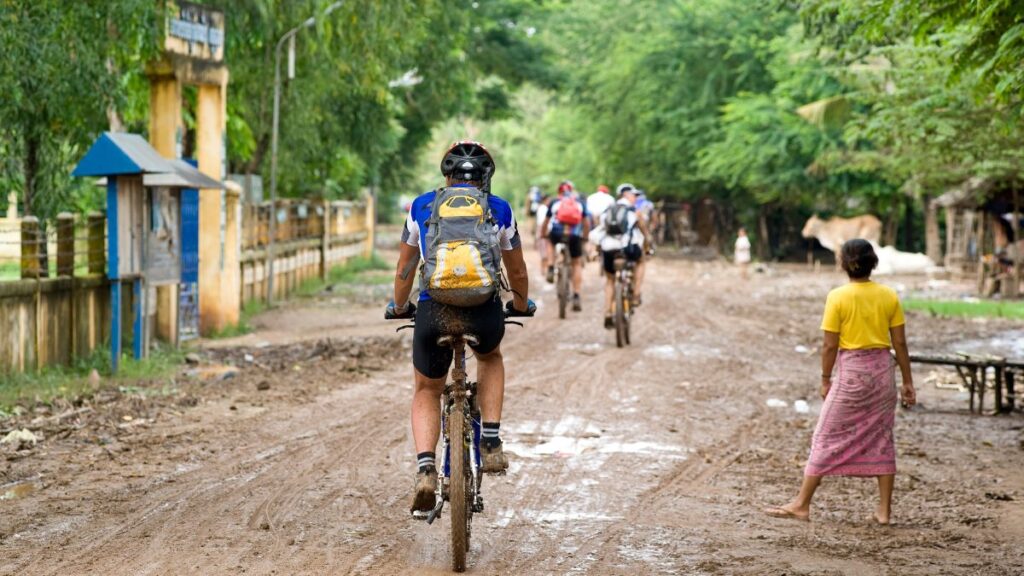 Mountain bike by the Mekong Delta on your adventure travel experience in Cambodia