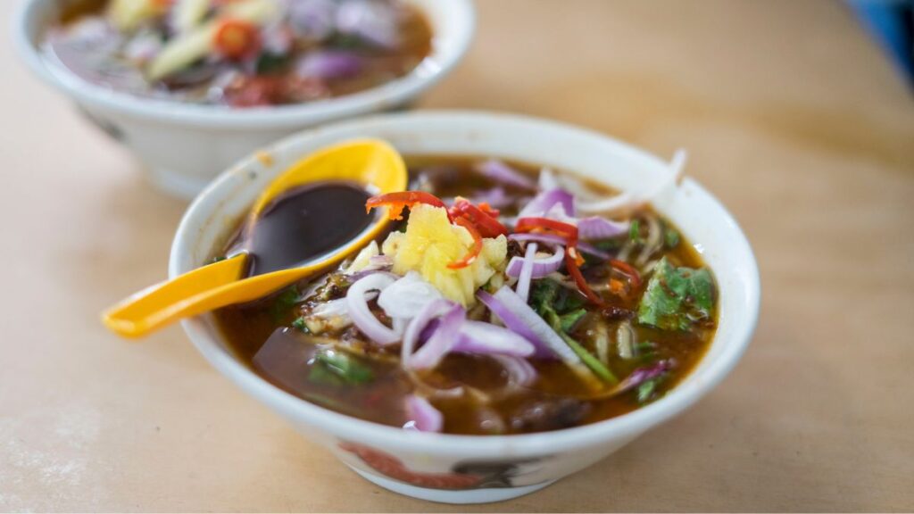 Assam laksa always makes every Southeast Asian food guide